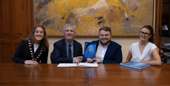 CNN Senior Correspondent Donie O'Sullivan presented with the Mutatio Factorem award by UCC Law Society