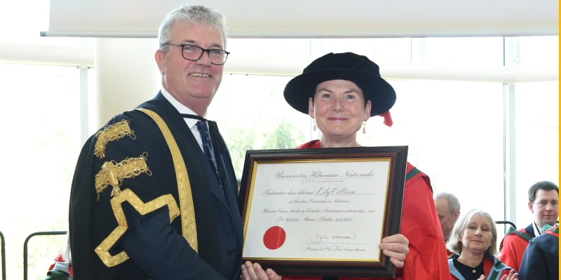 Lily Collison (R) with Professor John O'Halloran (L)
